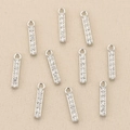 Detail view of ten silver vertical bar pendants set with cubic zirconia for jewelry making - Silver Bar with Zirconia Row (Style 7)