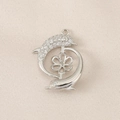 Macro view of double dolphin pendant base with shimmering zircons and pearl mounting - Silver