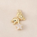 Détail d'un pendentif ours doré avec nœud en cristal et zircon en forme d'étoile - Style Doré (PJ0121)