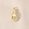 Macro shot of 18K gold-plated OK gesture pendant on premium gold silk texture background - OK Gesture Style (PJ0127) / 18K Gold