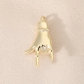 Macro shot of a 18K gold hand gesture pendant on beige textured fabric detail - Rock Gesture Style (PJ0126) / 18K Gold