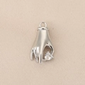 Macro detail of a silver hand-shaped pendant holding a heart-cut cubic zirconia stone - Hand Holding Heart Rhinestone Style (PJ0125) / Silver