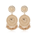 Bohemian gold tassel drop earrings with sunburst pattern and dangling metal beads - KC Gold