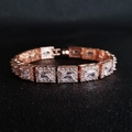 Detailed macro view of rose gold tennis bracelet with rectangular halo-set cubic zirconia - Rectangular Rhinestone Rose Gold Style (s5779)