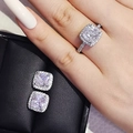 Elegant silver jewelry set with cushion-cut stones and halo setting including ring and studs - US 4.5 / White