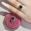 Luxury emerald-cut green gemstone ring with white zircon halo in a pink velvet box - Size 5 / Green