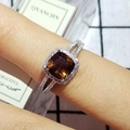 Anello di lusso con gambo diviso, gemma ambrata taglio cushion e pavé di zirconi - Marrone