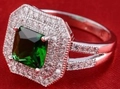 Luxury square emerald ring with double halo diamonds and split shank on red velvet - US 5 / Green