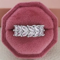 Elegant silver marquise cut leaf shaped zircon ring displayed on a velvet gift box - US 5 / White