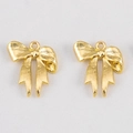 Detailed view of golden bow metal charms with textured relief and top loops for DIY jewelry - Ribbon Bowknot Double Sided-17.5x21