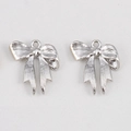 Macro view of silver bow-shaped jewelry pendants with vertical textures and metal hanging loops - Ribbon Bows - 17.5x21 (5 Pieces/pack)