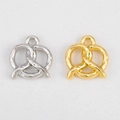 Pretzel shape pendant jewelry charms in gold and silver finish with hammered texture - Pretzel / Silver