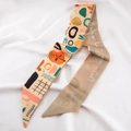 Fashionable long silk scarf ribbon with colorful geometric patterns and elegant text - Country Graffiti
