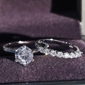 Elegant silver stackable wedding ring set featuring a large round cubic zirconia solitaire - US 5 / White