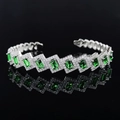 Elegant silver S925 open bracelet with eight rectangular emerald green gemstones - Green Geometric Style