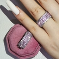 Macro shot of pink baguette-cut stones and white cubic zirconia on a silver ring band - Size 5 / Baguette Cut Eternity Style (r5436) / Pink