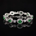 Classic silver bracelet with emerald-green gemstones and white zircon on black background - Luxury Oval Pear Green Stone Style (s7211) / Silver White Green