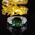 Classic silver ring with square emerald green gemstone and pear side stones on black - US 5 / Green