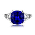 Elegant silver open ring with a large cushion-cut blue sapphire and sparkling side stones - US 6 / Blue