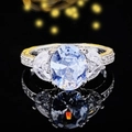 Anello di lusso con gemma ovale blu chiaro e fascia bicolore oro e argento lavorata - US 6 / Azzurro