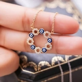 Collier mauvais œil doré à la mode avec émail bleu et zircons en boîte cadeau - Or