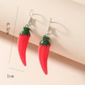 Macro detail of red chili pepper drop earrings with silver hooks and 6.5cm length - Red Chili (WEH1535)