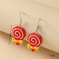 Detailed view of 3cm lollipop earrings with red spiral texture and yellow bow detail - Pink Lollipop (WEH1656)
