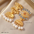 Detail of vintage evil eye gold earrings featuring blue gemstones and white pearl charms - Evil Eye Seashell Pearl Earrings / Eco Simulation Gold