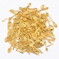 Macro shot of vintage gold cutlery charms with detailed European floral relief patterns - 50g Pack / Gold