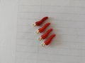 Macro shot of 4 red chili pepper charms with glossy enamel and gold metal rings - Chili Shape / 1 Piece / Red