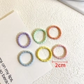 Pack de 6 gomas de pelo elásticas de 2cm en colores pastel para bebés con textura - Estilo Espiral de Color Claro / Empaque en bolsa