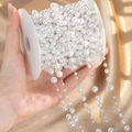 Detailed view of white pearl beaded chain roll on champagne silk for DIY jewelry making - Short / Silver