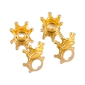 Detailed macro view of three 3D golden crown metal beads for DIY jewelry and accessory making - 10pcs/Pack / Gold