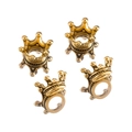 Detailed close-up of golden crown ear gauges showing metallic texture and ornate design - Antique Gold