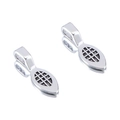 Macro shot of silver alloy bail connectors with hollow mesh patterns and mirror reflection - Antique Silver