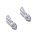 Macro shot of silver metal jewelry glue-on bail connectors with hole texture for DIY crafting - 10pcs/Pack / Antique Silver