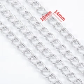 Detail showing 10x14mm silver twist curb chain links for DIY jewelry making - Silver