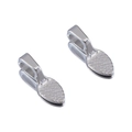 Macro shot of silver alloy leaf charms with embossed texture and polished metal finish - 10pcs/Pack / White K/Silver
