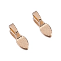Detailed view of golden teardrop pendant clasps with embossed dot texture for DIY jewelry - KC Gold