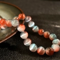 8mm zweifarbige Katzenaugenperlen in Rotorange und Hellblau für DIY-Schmuckherstellung - Rot Blau Farbverlauf
