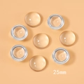 Detailed macro view of 25mm clear dome glass cabochons for DIY jewelry making supplies - 25mm