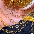 Handheld view of gold stainless steel diamond chain with hammered texture on a spool - 1 Meter/Pack / Gold-8x11.5
