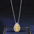 Elegante ketting met een peervormige gele edelsteen en halo-zetting in S925 zilver - Geel