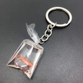 Macro detail of a creative goldfish in water bag keychain with polished silver ring - Red Simulation Fish Style (6)