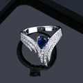 Elegante anillo con forma de ala con piedra azul de corte pera y diamantes brillantes - US 6 / Azul