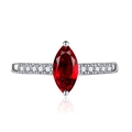 Elegant marquise cut ruby ring in silver with sparkling side stones and a white background - Adjustable Open / Red