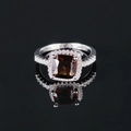 Luxury silver ring featuring a large square smoky quartz stone with halo diamonds - Brown