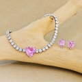 Schmuckset mit rosa Herz-Zirkonia Tennisarmband und Ohrsteckern in Silberoptik - Einheitsgröße / Rosa