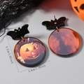 Detail of Halloween pumpkin earrings with black bat studs and marble orange resin charm - Pumpkin Smiley Style (WEH5519)