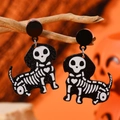 Halloween dachshund skeleton earrings in black glitter acrylic on an orange background - Dachshund Skeleton Dangle Style (WEH5530)